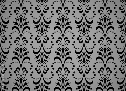 Wallpaper in the style of Baroque. Seamless vector background. Black and gray floral ornament. Graphic pattern for fabric, wallpaper, packaging. Ornate Damask flower ornament