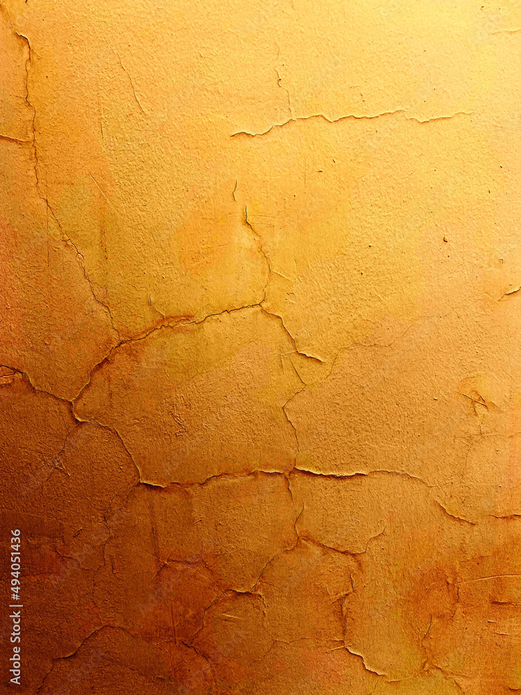 Fototapeta premium old wall cracks background dark gold