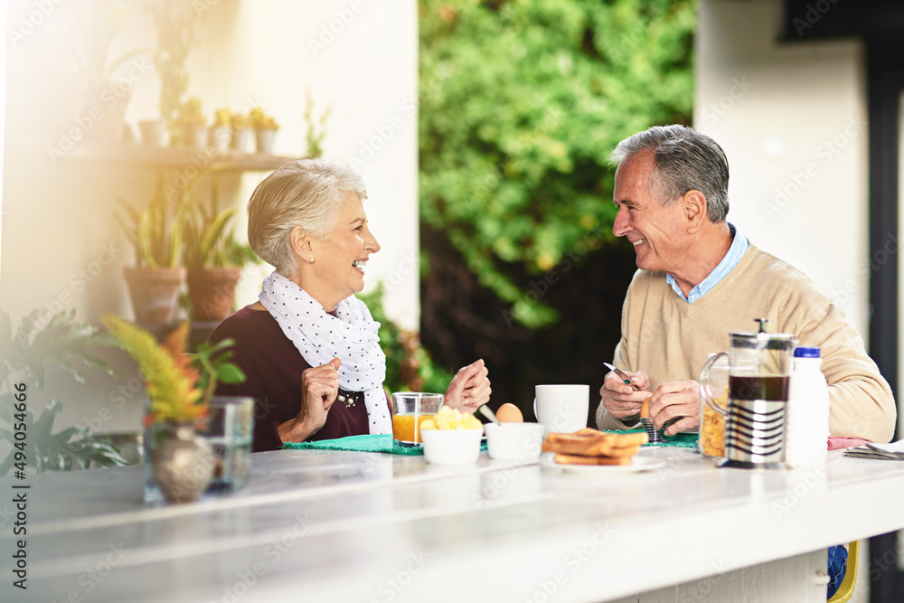 Enjoying the most important meal of the day together. Shot of a happy senior couple enjoying breakfast together at homet. Enjoying the most important meal of the day together. Shot of a happy senior couple enjoying breakfast together at homet.