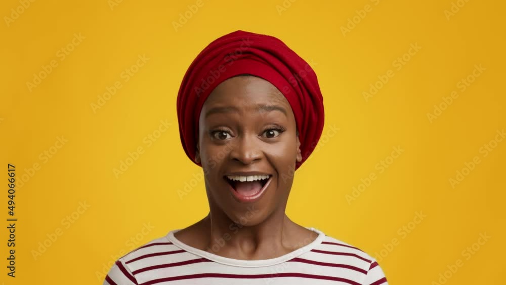 Excited Black Woman In Headwrap Nodding Head, Yellow Background Excited Black Woman In Headwrap Nodding Head, Yellow Background