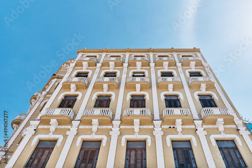 Facade of Gomez Villa office building built in 1909 in eclectic style. Plaza Vieja, Havana, Cuba. photo