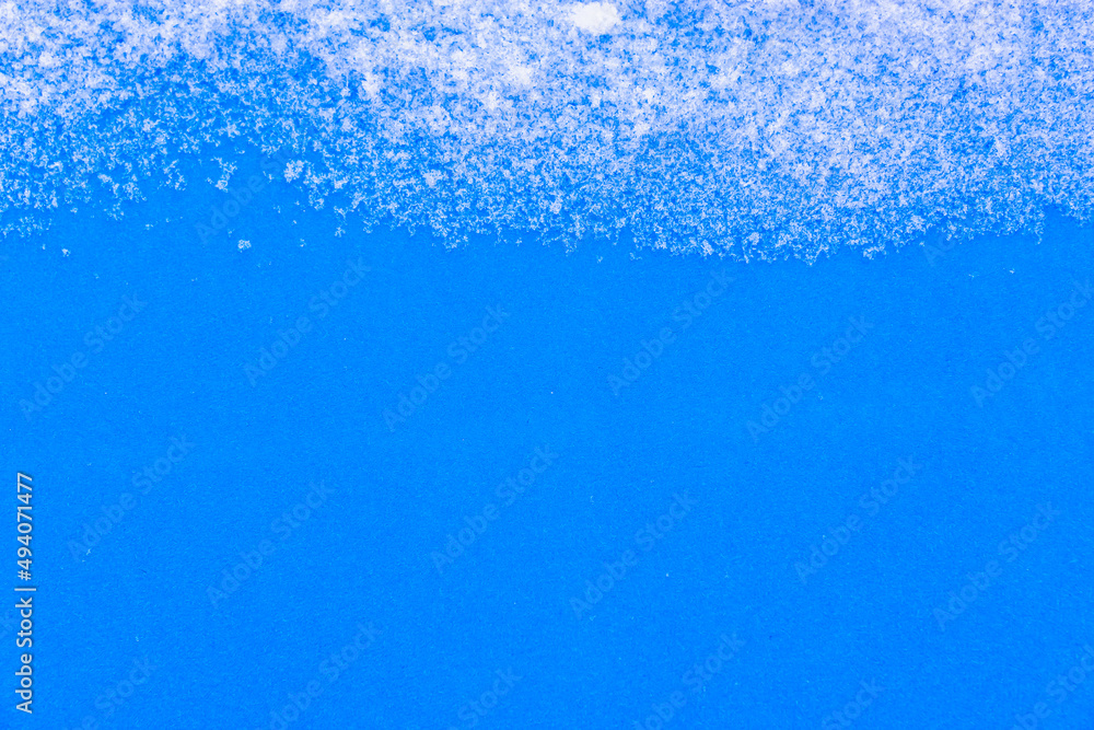 Snow and blue table background.
