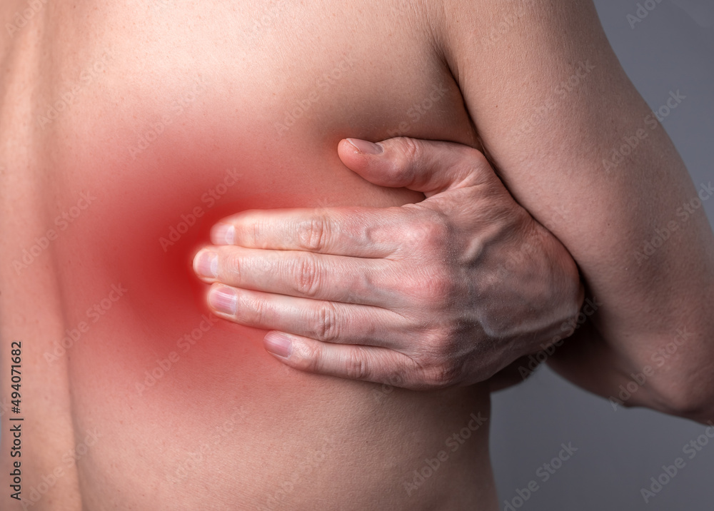 Back pain, self-massage ofaching trigger points, spots on backside, close up. High quality photo Back pain, self-massage ofaching trigger points, spots on backside, close up. High quality photo
