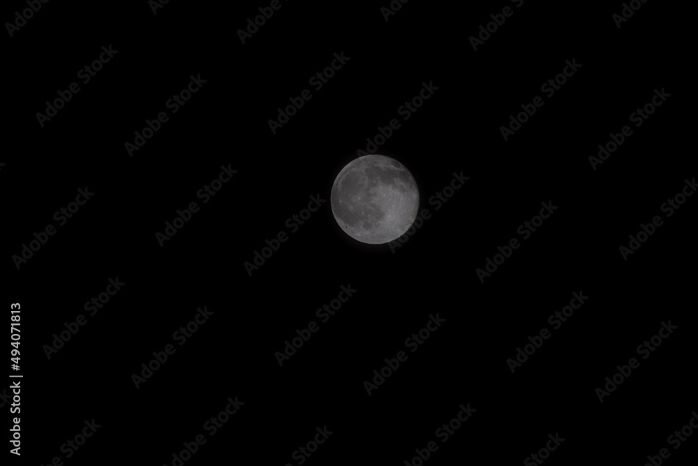 A beautiful image of a full moon captured with an RF Canon 100-500 telephoto lens. Wonderful picture with a great composition of the night sky. A beautiful image of a full moon captured with an RF Canon 100-500 telephoto lens. Wonderful picture with a great composition of the night sky.