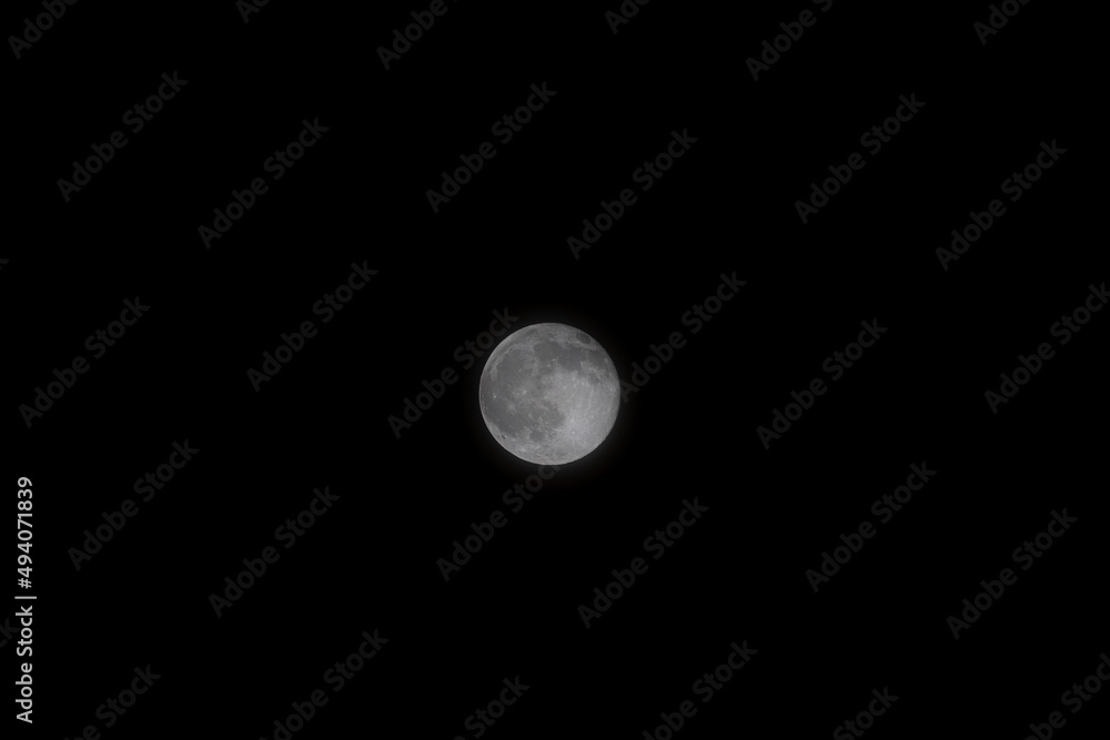 A beautiful image of a full moon captured with an RF Canon 100-500 telephoto lens. Wonderful picture with a great composition of the night sky. A beautiful image of a full moon captured with an RF Canon 100-500 telephoto lens. Wonderful picture with a great composition of the night sky.