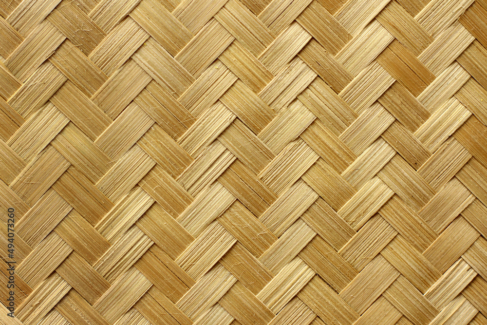 Weave texture. natural straw background. the texture of rattan weaving. heterogeneity and uniqueness of natural materials Weave texture. natural straw background. the texture of rattan weaving. heterogeneity and uniqueness of natural materials