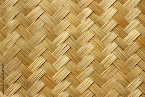Weave texture. natural straw background. the texture of rattan weaving. heterogeneity and uniqueness of natural materials photo
