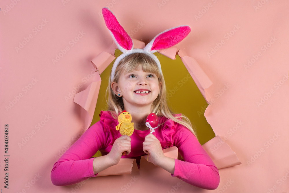 Cute little girl on Easter holiday with a rabbit costume Cute little girl on Easter holiday with a rabbit costume
