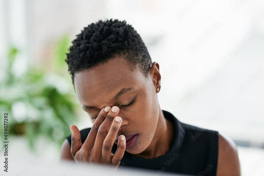 Work stress, the struggle is real. Shot of a young businesswoman experiencing stress at work. Work stress, the struggle is real. Shot of a young businesswoman experiencing stress at work.