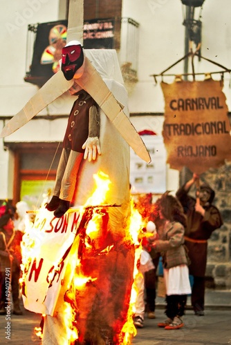 Enciso, Spain – March 5, 2022: Burning of Judas dressed as mill blades. Traditional carnival of Enciso.