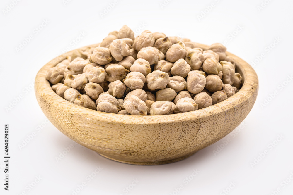 raw chickpeas on white background isolated inside rustic wooden bowl raw chickpeas on white background isolated inside rustic wooden bowl
