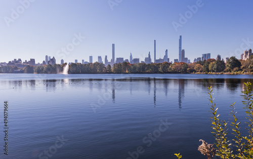 Central Park's lagoon with the New York's skyline 
