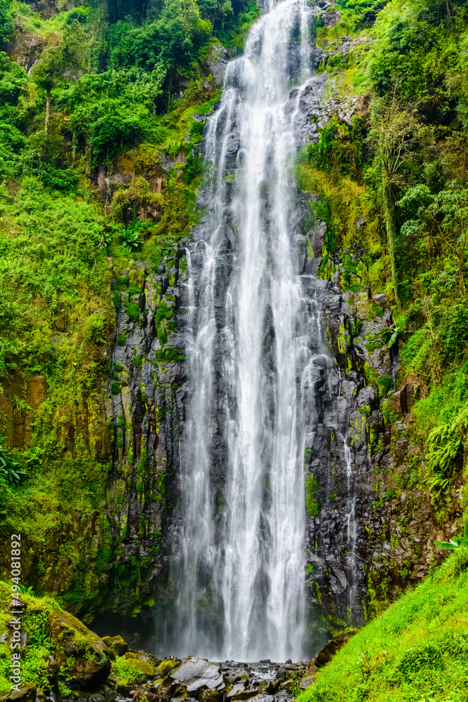 View of Materuni waterfall at foot of mountain Kilimanjaro not far from the city Moshi, Tanzania View of Materuni waterfall at foot of mountain Kilimanjaro not far from the city Moshi, Tanzania