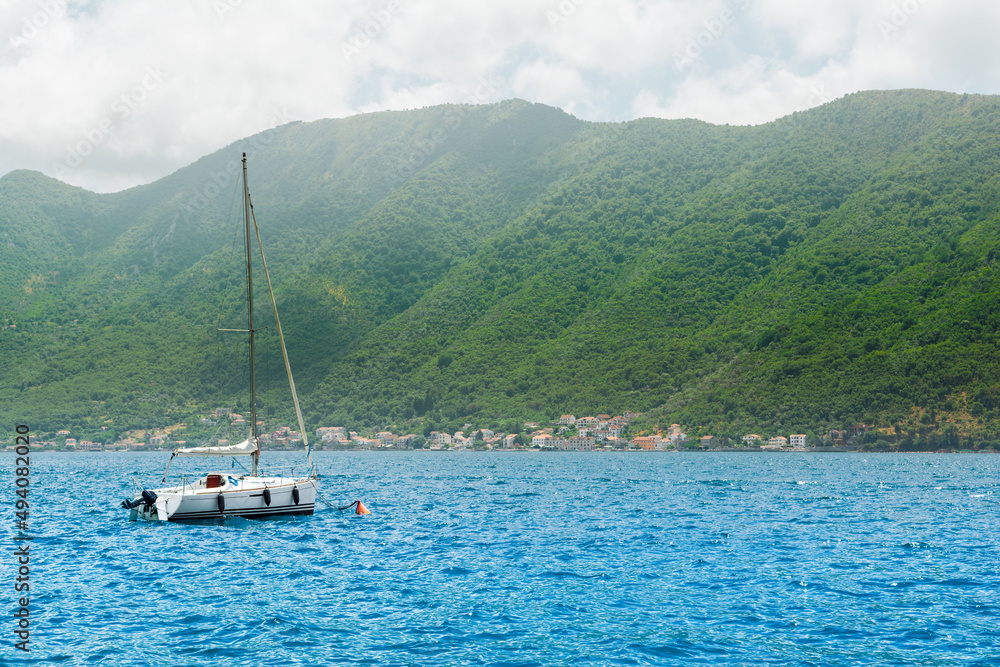 A beautiful summer landscape of the Bay of Kotor coastline - Boka Bay, Montenegro A beautiful summer landscape of the Bay of Kotor coastline - Boka Bay, Montenegro