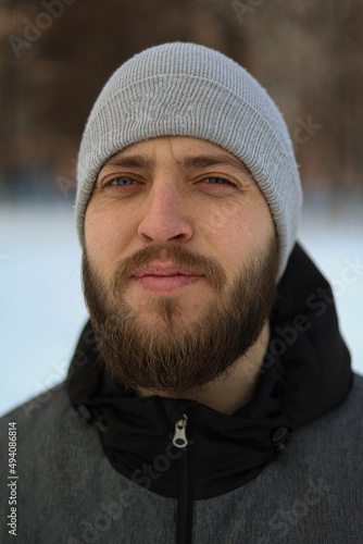 bearded man. This is a handsome male portrait. 