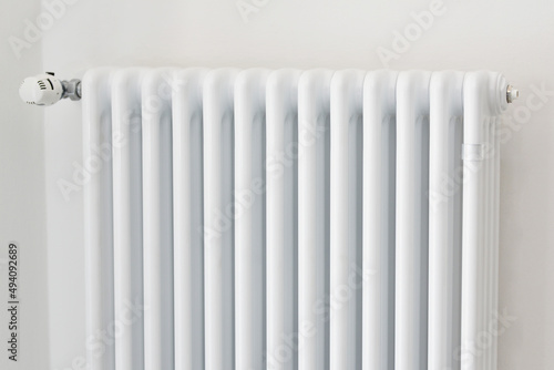 Wallpaper Mural White heating radiator on wall. Heating white radiator radiator in living room.  Torontodigital.ca