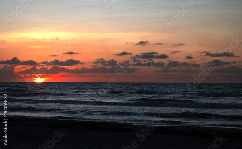 Sunrise on beach horizon © Michael
