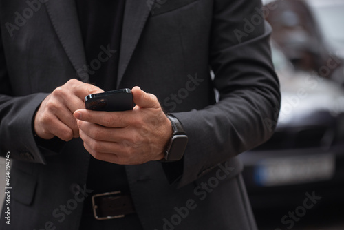 businessman holding a mobile