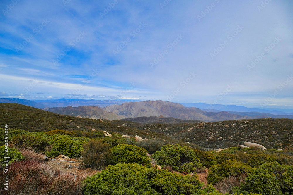 View of the Santa Rosa Mountains from the Sunrise Highway, a road that runs through the Laguna Mountains east of San Diego, California, USA. Sparse alpine vegetation.