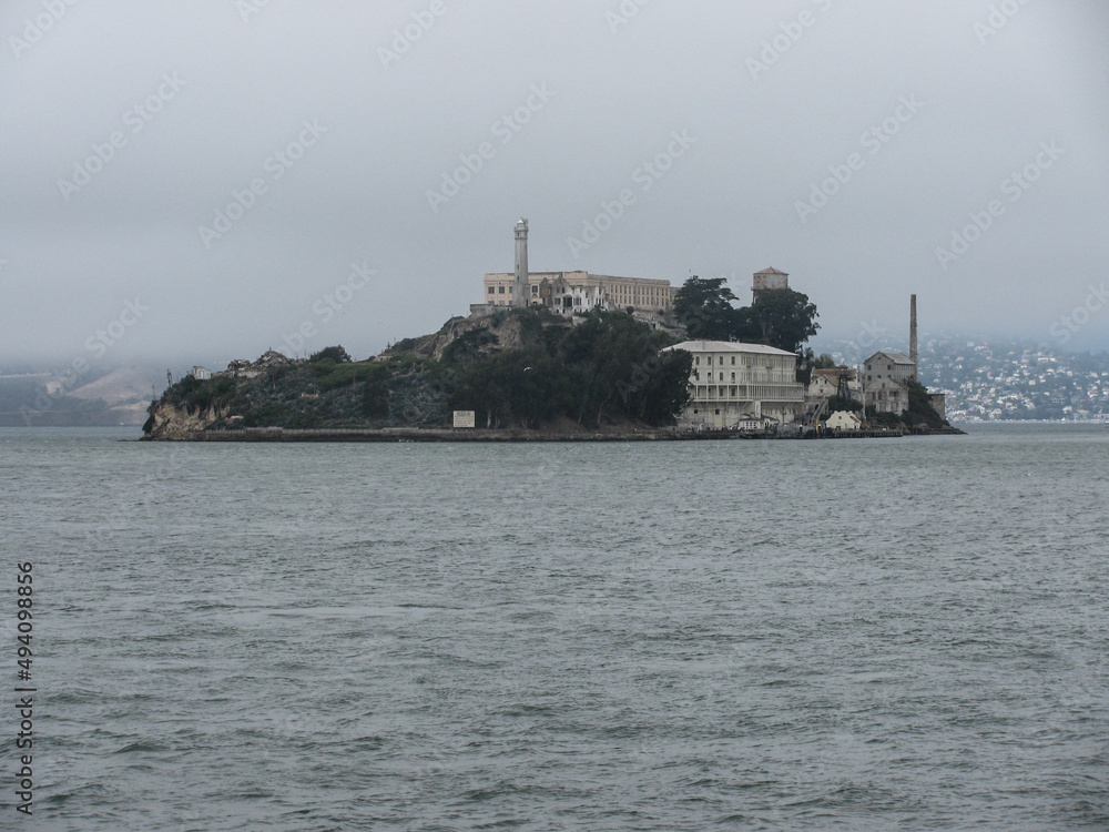 Alcatraz Island against morning fog.