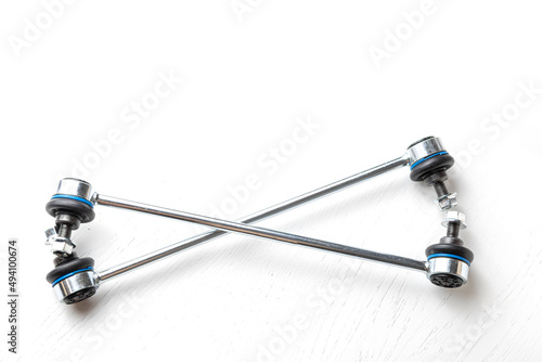 new car suspension stabilizer bar on a white background. photo