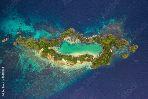 A lake within an island. High angle shot of a little islets and islands in the middle of Indonesia.
