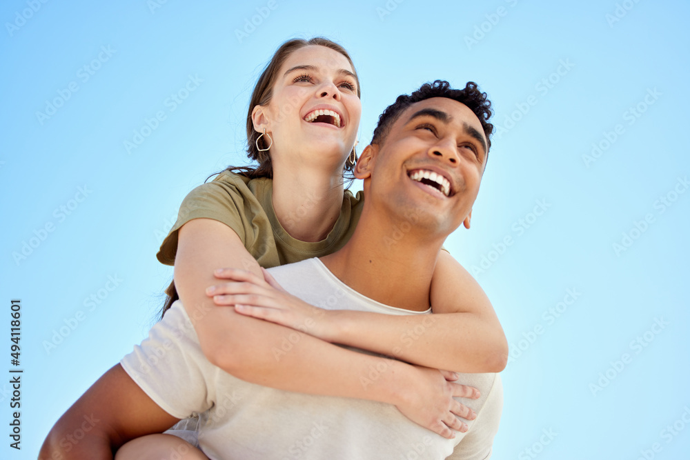 Summer is our favourite season. Shot of a young couple enjoying a day at the beach. Summer is our favourite season. Shot of a young couple enjoying a day at the beach.