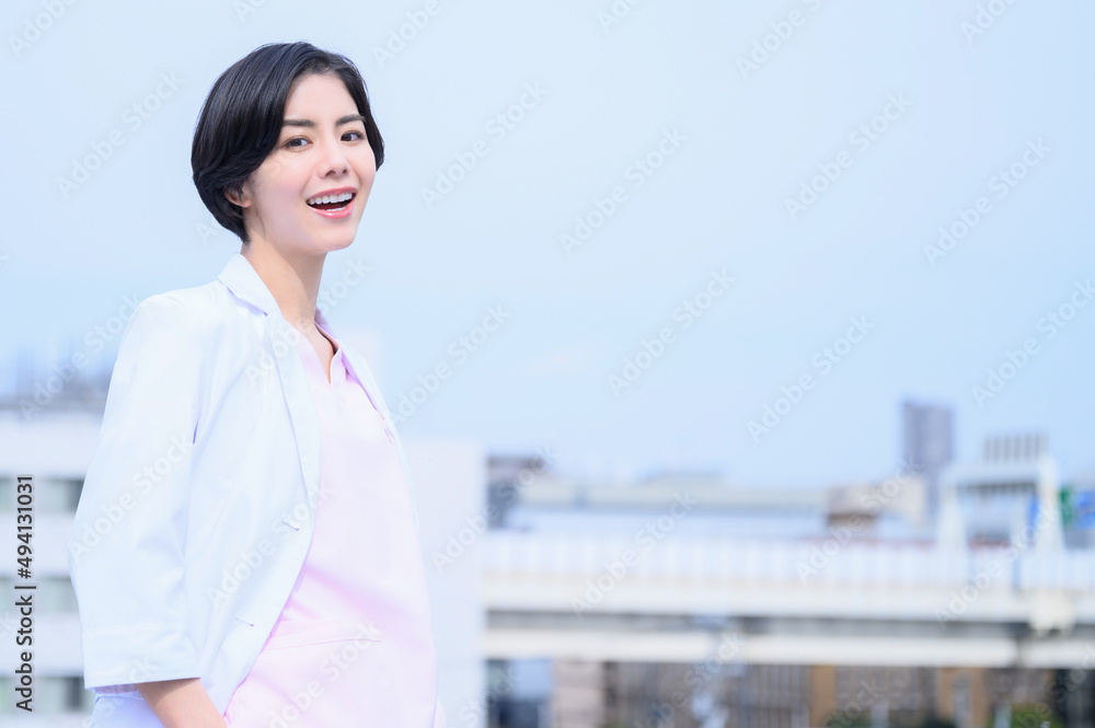 A cool, dependable female doctor looking at the camera. A cool, dependable female doctor looking at the camera.