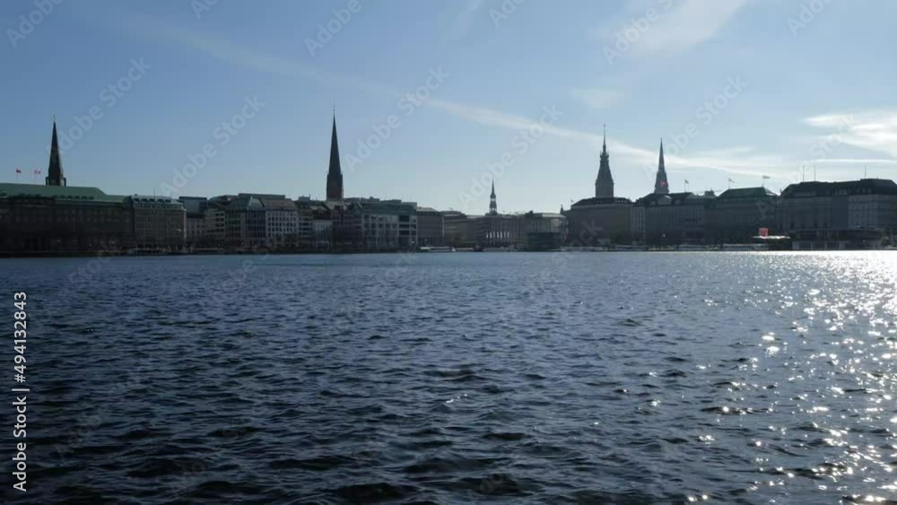 Lake on foreground and Hamburg cityscape on the background Lake on foreground and Hamburg cityscape on the background