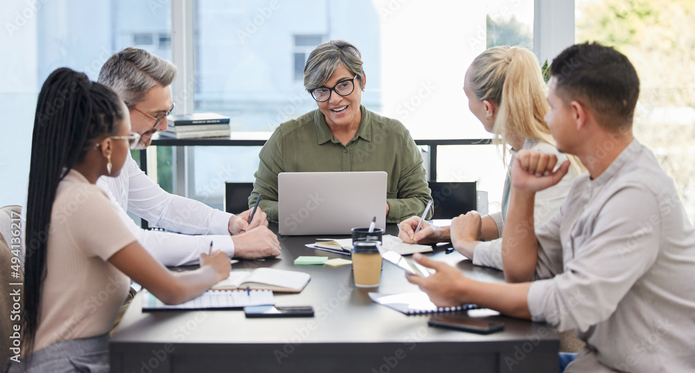 Im really loving this feedback. Shot of a team of business people having a meeting.