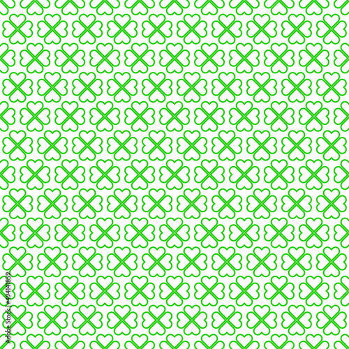 St.Patrick's Day. Green clover leaves on white background pattern. Greenheart shape pattern on white backdrop.