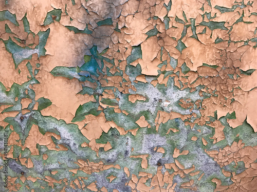 Close up of paint peeling from the walls photo