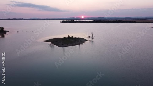 Sotonera Dam Lake (Embalse de la Sotonera) in Huesca, Spain - Aerial Drone View during sunset photo