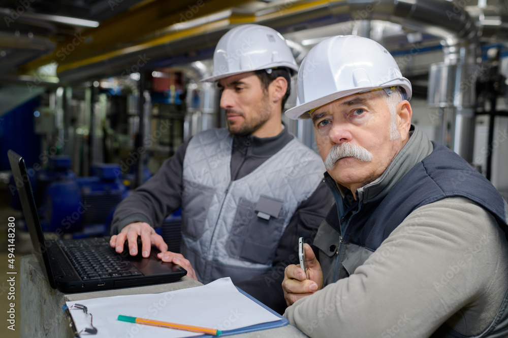 technician working in factory and doing quality control technician working in factory and doing quality control