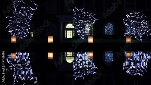 Christmas Night Illuminations Mirroring In Elon University Fountain photo
