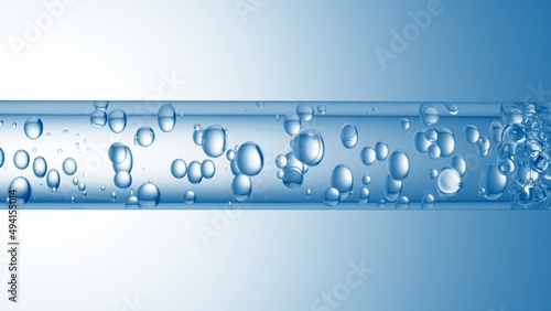 Macro shot of different sized clear bubbles flowing in glass tube with clear liquid on pale blue background | Abstract body care cosmetics mixing concept