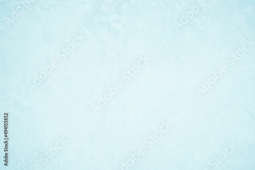 Blue concrete stone texture for background in summer wallpaper. Concrete abstract wall of light cyan color, cement texture mint green for design.