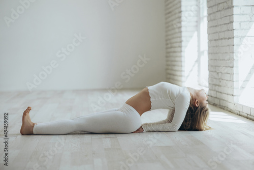 Yoga. Woman doing yoga in the studio. High quality photo
