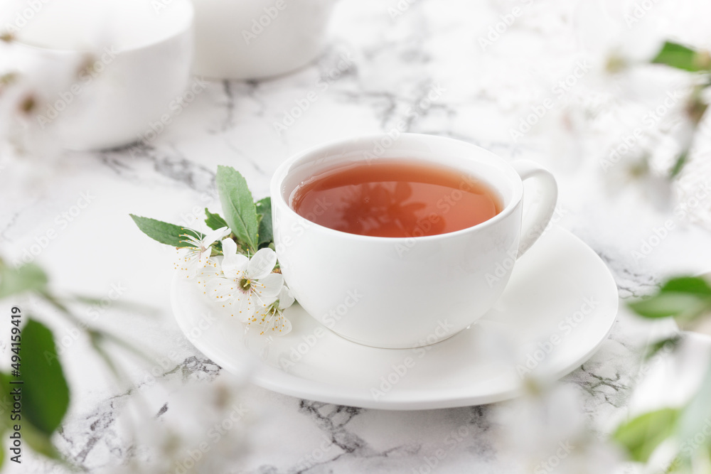 cup of tea with spring flowers cup of tea with spring flowers