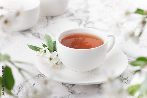 cup of tea with spring flowers