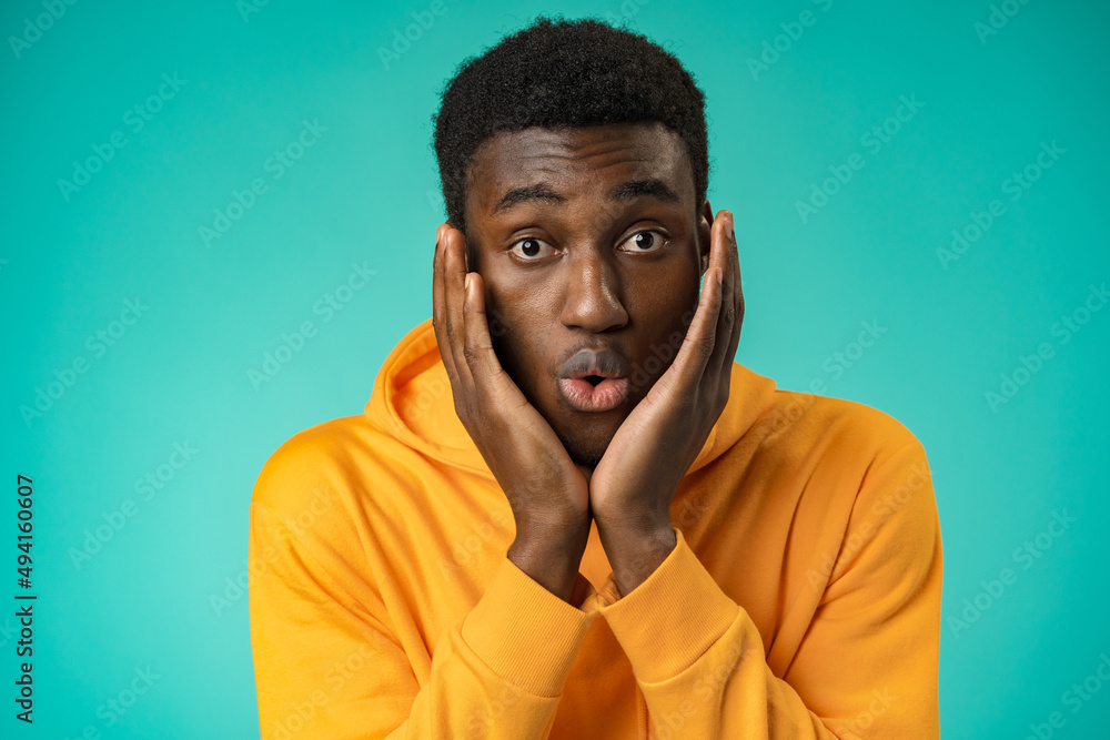 Young black anxious man worried nervous fail problem over mint background Young black anxious man worried nervous fail problem over mint background
