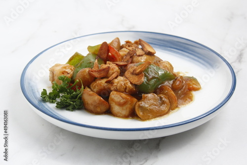 Freshly cooked chicken and mushroom in garlic gravy