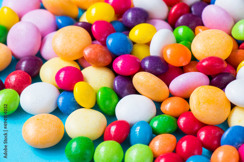Candies on the colorful background Candies on the colorful background