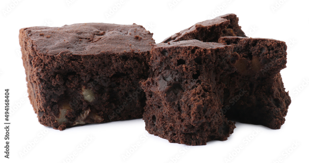 Delicious chocolate brownies with nuts on white background