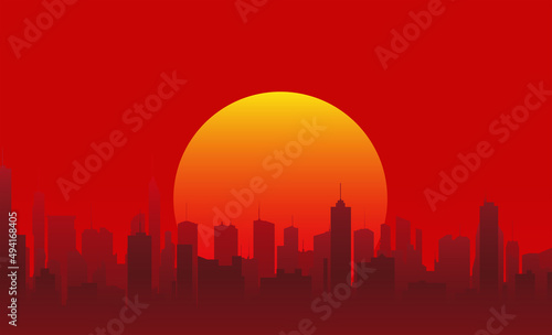 silhouette of the city of the future with skyscrapers on a red sky background and the setting sun