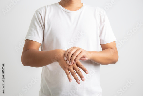 Man has hand numbness and peripheral neuropathy on white background, health and medical concept