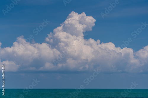 Blue sky  white cloud and calm sea water  sunny day