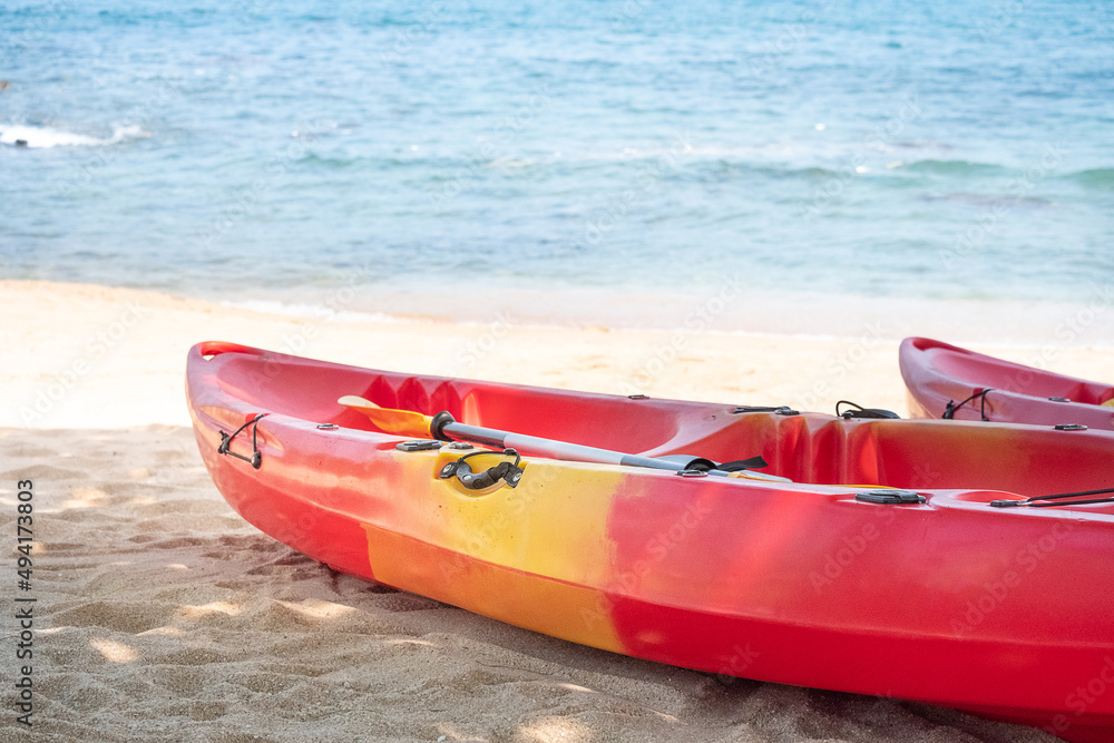 Kayaks on beach with blue sea background, Samui Island (Koh Samui), Thailand. Kayaks on beach with blue sea background, Samui Island (Koh Samui), Thailand.