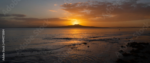 Rangitoto Island at dawn, Milford Beach, Auckland. photo