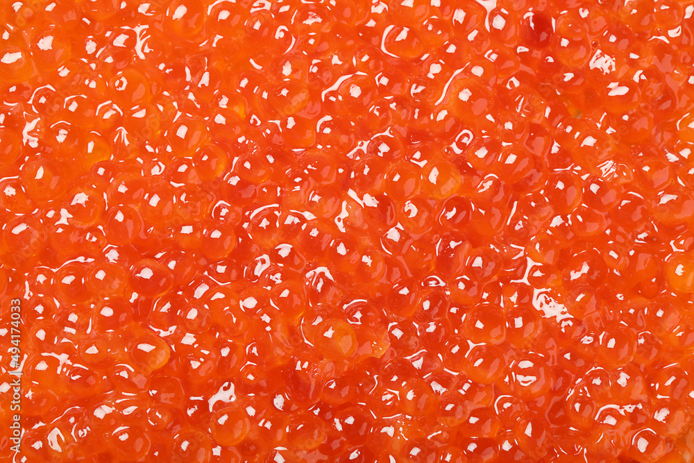 Delicious red caviar as background, top view Delicious red caviar as background, top view